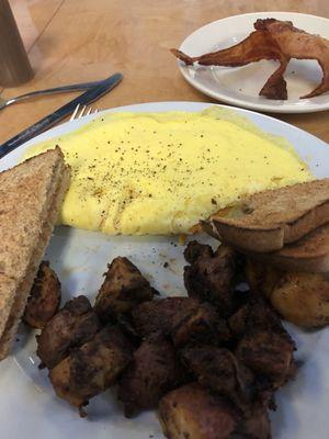 Dry omelet and cumin covered home fries