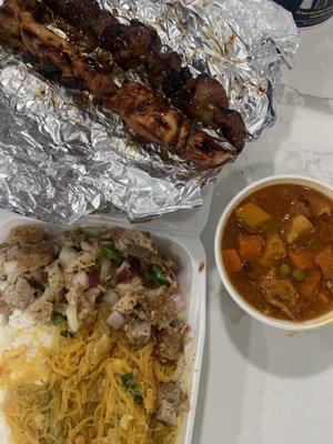 Chicken and Pork bbq skewers, pork menudo, pork sisig and pancit.