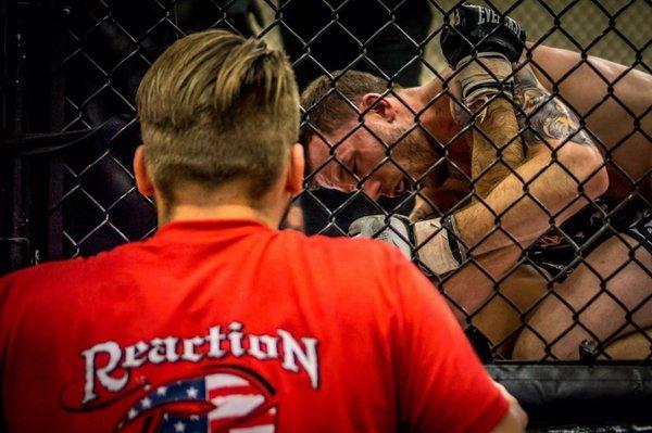 Professor coaching one of the first MMA fighters at Reaction, in his successful Pro title defense (Matt Metts).