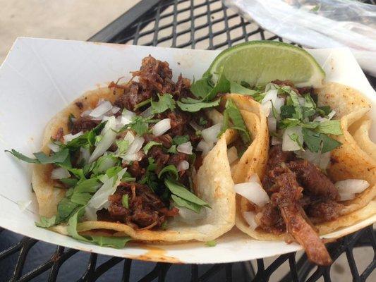 Barbacoa Tacos!  Double wrapped in fresh corn tortillas, cilantro, onions, and lime...  I washed mine down with an ice cold Mexican Coke :)