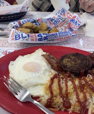 Eggs, bacon, sausage, and hash browns, fried pickles