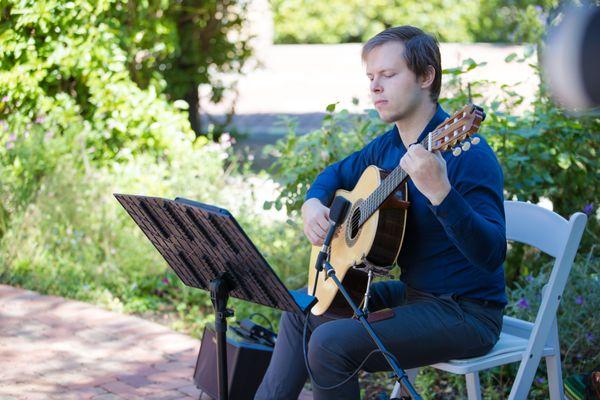 Christopher playing at our wedding