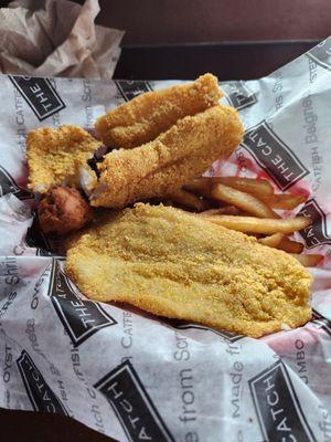 Medium Fried Catch... 2 catfish filet, fries and 2 hushpuppies.