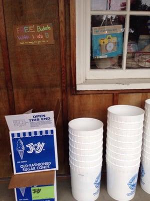 Free buckets with lids out front