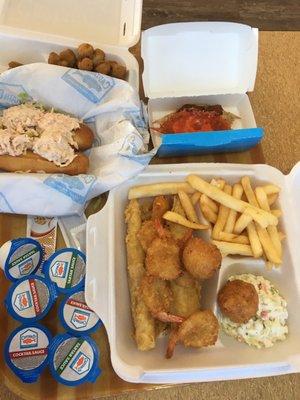 Deluxe seafood platter, and lobster rolls. Plenty of seafood under $20.