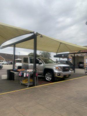 My truck with doors open waiting to get detailed but employees had to stop to do others.... need to finish what you started!!!