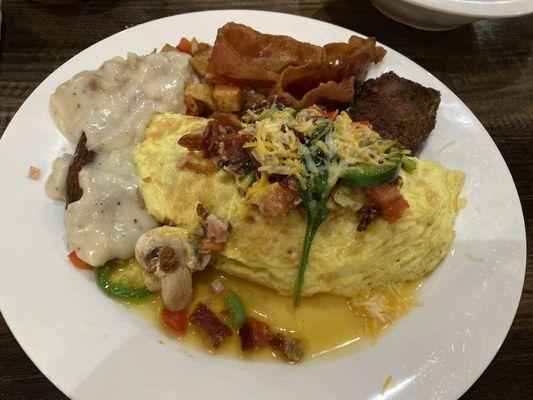 Everything Omelette, gravy, bacon, steak and potatoes