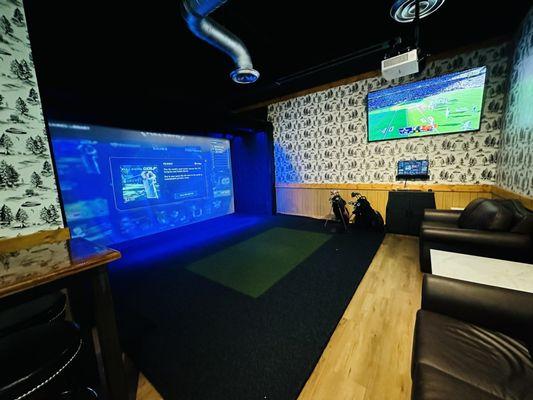 One of two golf simulators with your own seating area