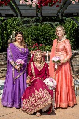 Bridesmaid outfits- Bright lehengas with beautiful gold detailing.