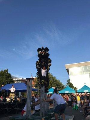 Our black lion performing Portland's first ever jong routine at Jade District Night Market - White Lotus Dragon and Lion Dance, Portland, OR