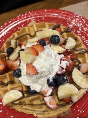 Waffles with Nutella, strawberries, bananas & blueberries