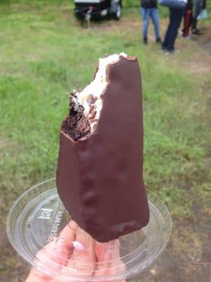 A chocolate dipped cheesecake pop from Sheetz Cheesecake food truck.