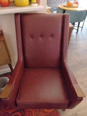 MCM high back arm chair reupholstered in oxblood vinyl. Easy care, pet resistant and very comfortable. Gorgeous.