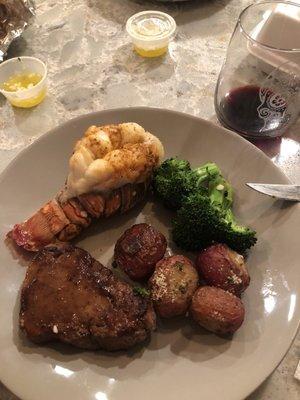 Steak lobster potatoes broccoli valentines special