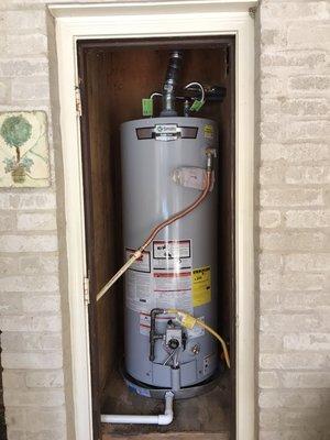 Rerouted all plumbing and moved heater into this outdoor closet.  Inspection pulled and passed.