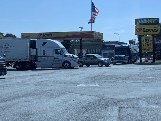 Semi trucks fueling block petro gas pumps