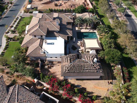 Tile roof installation in progress.