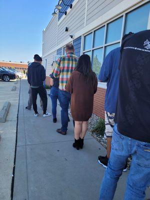 Line outside. Waiting in line for an online order.