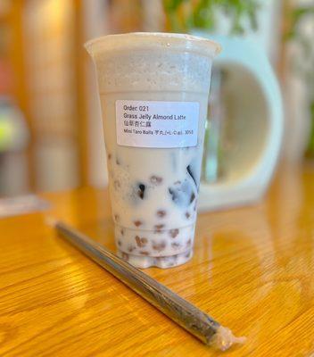 Grass Jelly Almond Latte w/ mini taro balls 7/2022