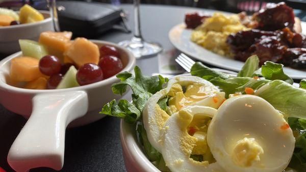 Fruit menagerie and salad (there were a dozen dressings to choose from!)