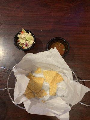 Chips and salsa with slaw.