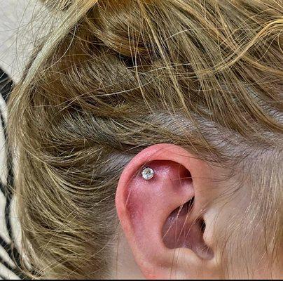 Flat rook ear piercing. Piercer: Jesse Ballesteros