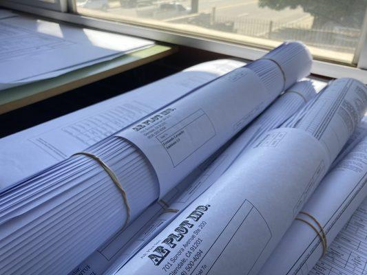 Wide format scanning and printing for architectural plans.