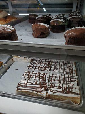 Cream layered Puff pastry. Chocolate cupcakes