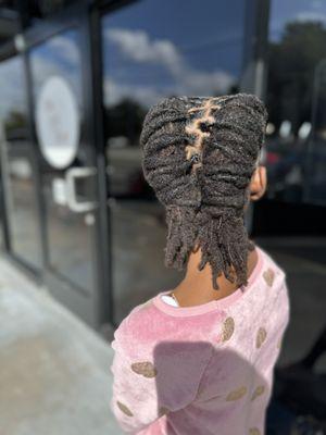 Child's loc retwist and style