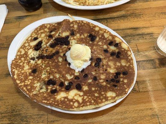 One buttermilk pancake with chocolate chips