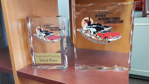 Acrylic awards with digital imprint and engraved plate.