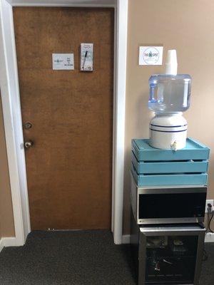 This is the entrance to The Oil Spot - with a reverse osmosis water cooler.