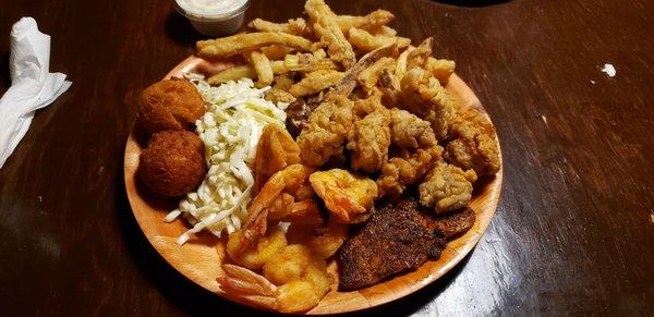 Blackened flounder, fried shrimp and fried oysters.  All good.  Fries were different.   Not bad just not my liking.