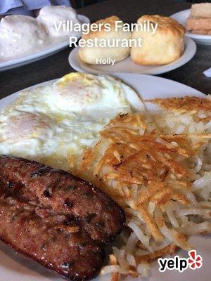 Jalapeño cheddar bratwurst, 2 eggs over medium, hash browns, biscuits and gravy  It was so good! Outstanding!