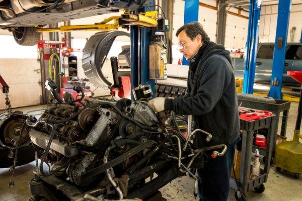 One of our technicians preparing a replacement engine