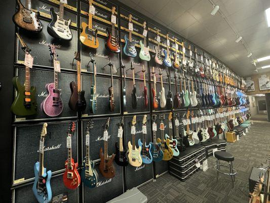 Now that's a guitar  wall.