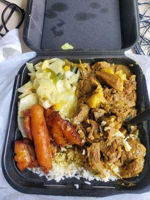 Curry goat and white rice (comes with plantain, cabbage, and festival)