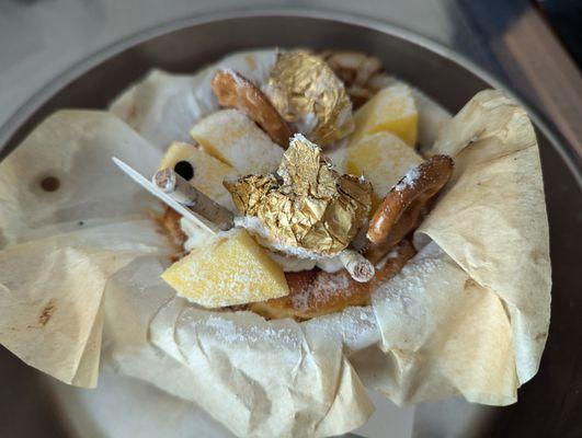 Ferrero rocher wrapper on the cake.