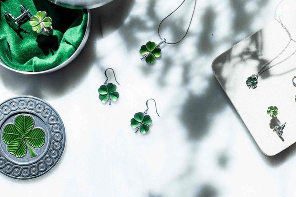 A selection of four-leaf clover jewelry and accessories