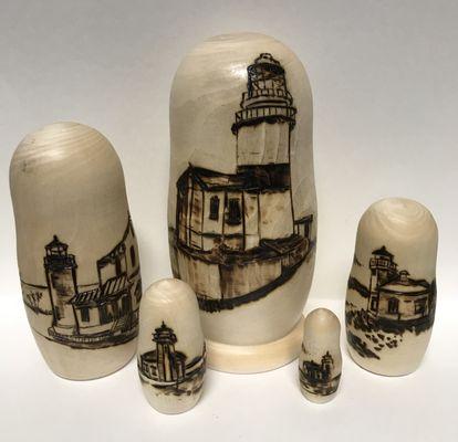 I used a hot tip to wood burn this stacking doll of WA. St. Lighthouses. The name of each lighthouse is on the bottom of each doll.