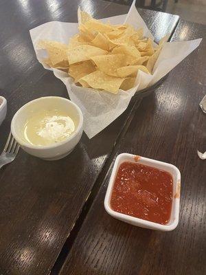 White queso and chips. Salsa was ok