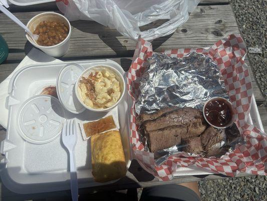 Eating brisket in the near by park bench.