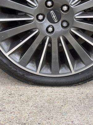 Flat tire from accident that they lied and said there was no damage to