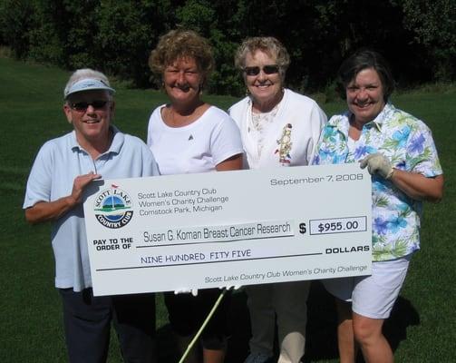 Women's Charity Challenge check presentation