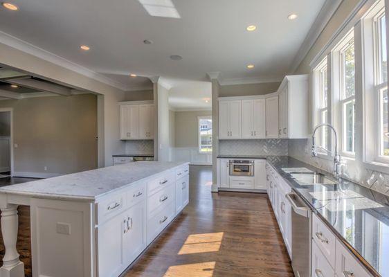 Transitional White Kitchen with large island