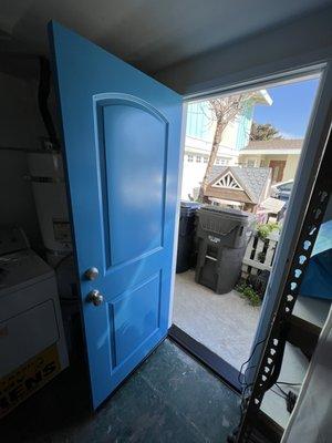 Here is the new door we bought with a new interior casing, black door bottom, hinges and white weather stripping.