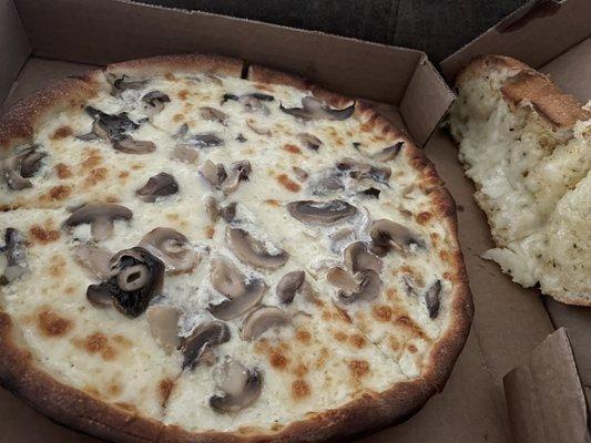 Small mushroom pizza and small garlic bread