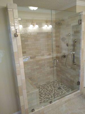 Custom tile remodel! We converted an old tub/shower combo into a beautiful walk in tile shower.