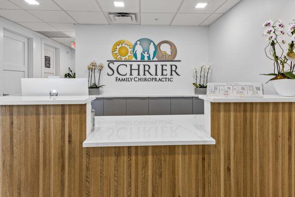 We love how our new front desk and office design came out