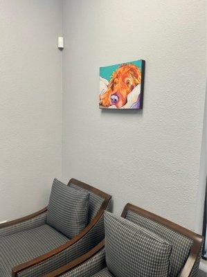 Seating area w/ wall art